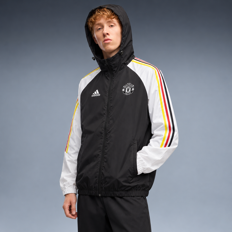 fd-gen corta-vento-manchester-united-24-25-preto-e-branco tres-quartos