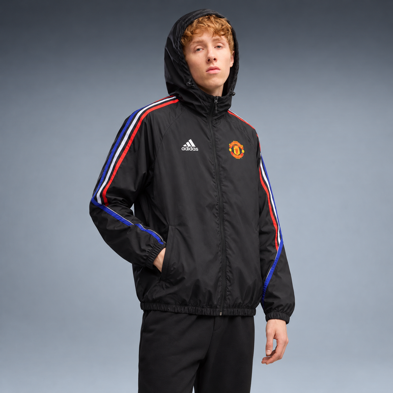 fd-gen corta-vento-manchester-united-24-25-preto-e-vermelho tres-quartos