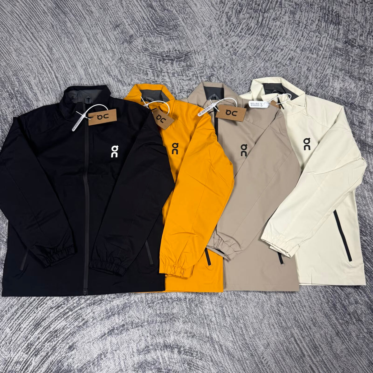 On Windbreaker - Black/Yellow/Beige
